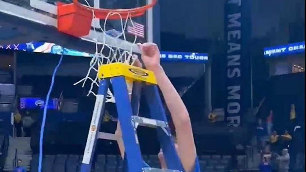 PHOTO: University of Florida player Olivier Rioux is seen cutting the net after the team's SEC Championship win in a video shared online by SEC Network.