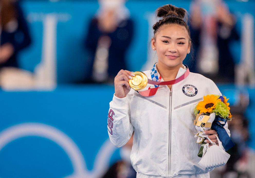 PHOTO: Sunisa Lee of the United States on the podium with her gold medal after winning the All-Around Final for Women at Ariake Gymnastics Centre during the Tokyo 2020 Summer Olympic Games, July 29, 2021, in Tokyo.