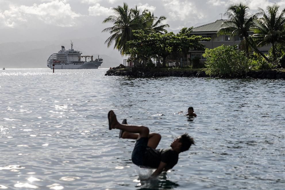 PHOTO: The Aranui 5, a cruise ship-cum-freighter where some of the athletes competing at the Paris 2024 Olympics surfing competition will stay, is seen near Teahupo'o, Tahiti, French Polynesia, July 25, 2024. 