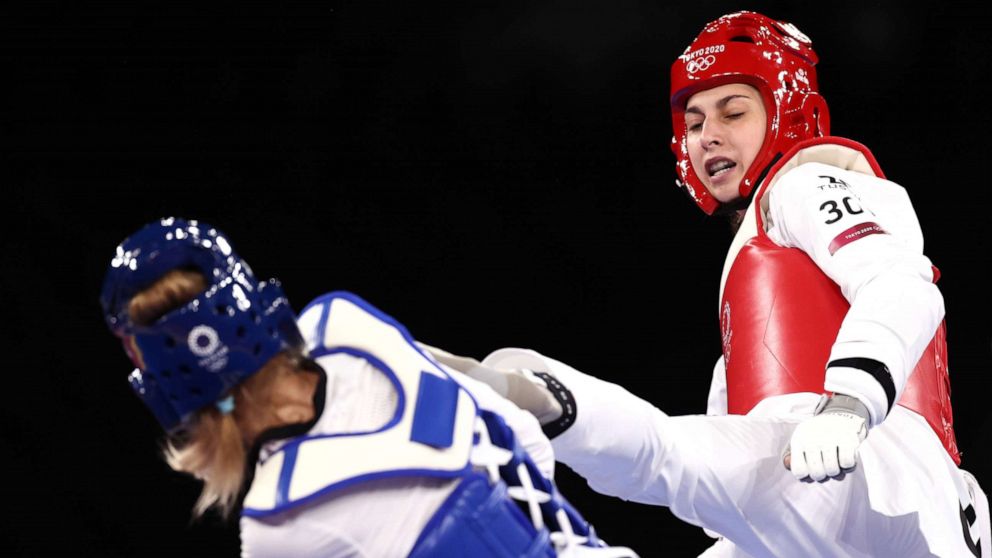 PHOTO: Anastasija Zolotic, right, competes defeats Tatiana Minina of the Russian Olympic Committee in the Women's -57kg Taekwondo gold medal bout at the Tokyo 2020 Olympic Games at on July 25, 2021 in Chiba, Japan.