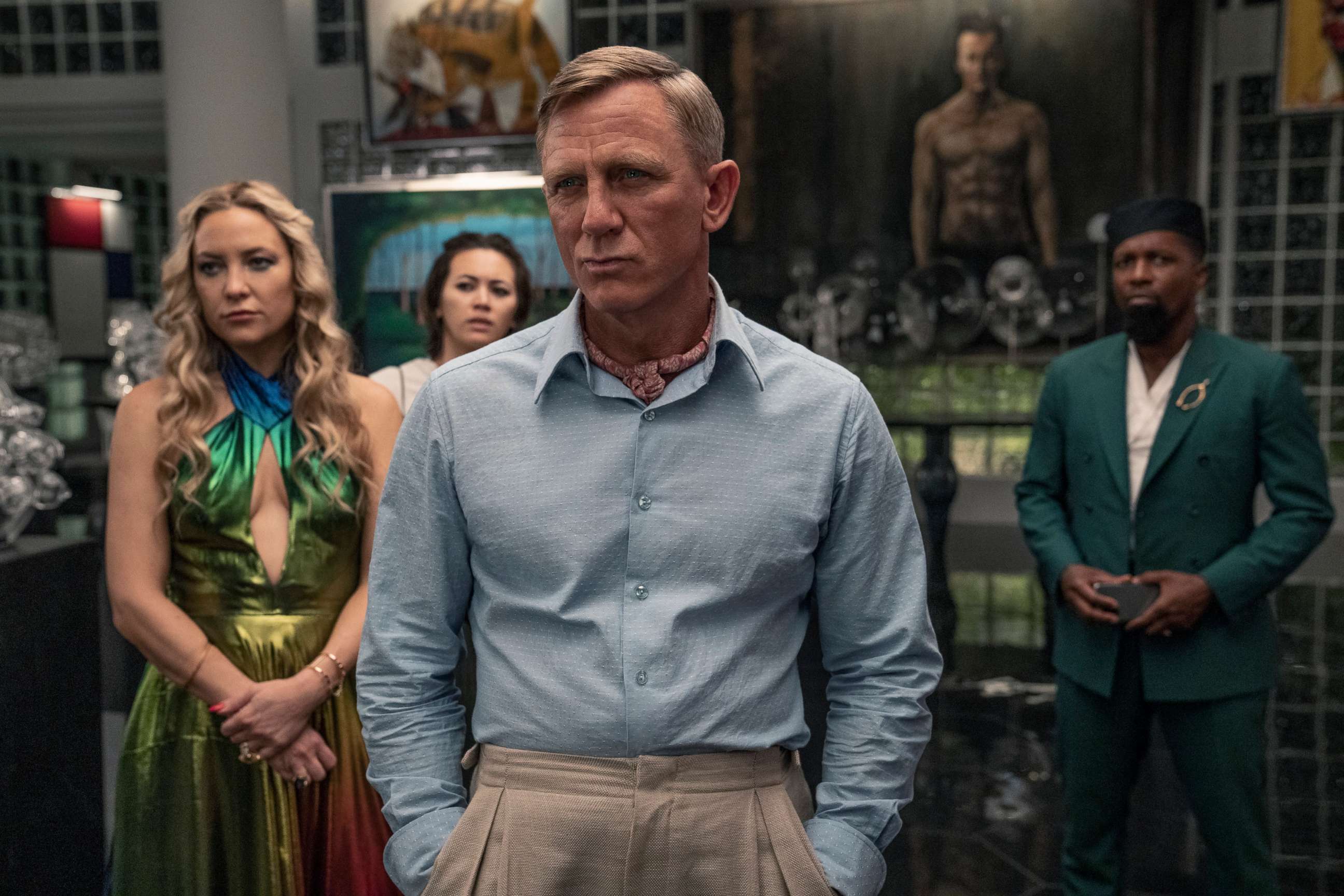 PHOTO: Kate Hudson as Birdie, Jessica Henwick as Peg, Daniel Craig as Detective Benoit Blanc, and Leslie Odom Jr. as Lionel in "Glass Onion: A Knives Out Mystery," 2022.