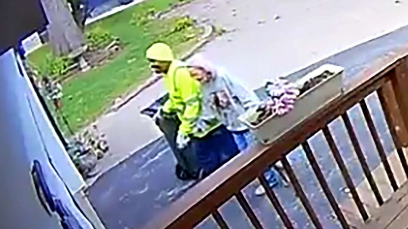 PHOTO: Waste Management employee Billy Shelby walks 88-year-old Opal Zucca's trashcan up her driveway for her each week after fell in January.