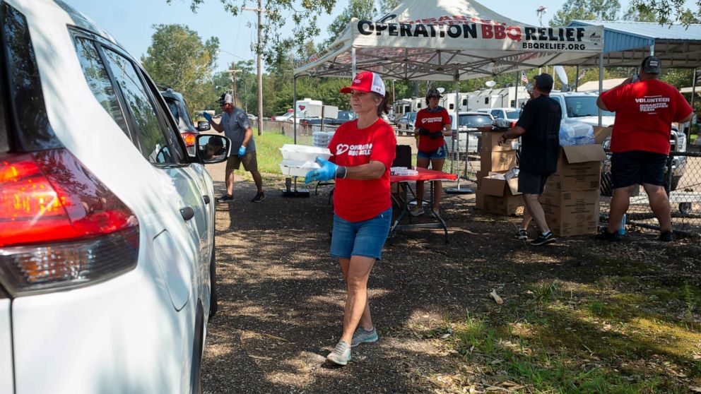 PHOTO: Volunteers work for Operation BBQ Relief in Hammond, La., to provide meals to families and first responders, Sept. 2, 2021.