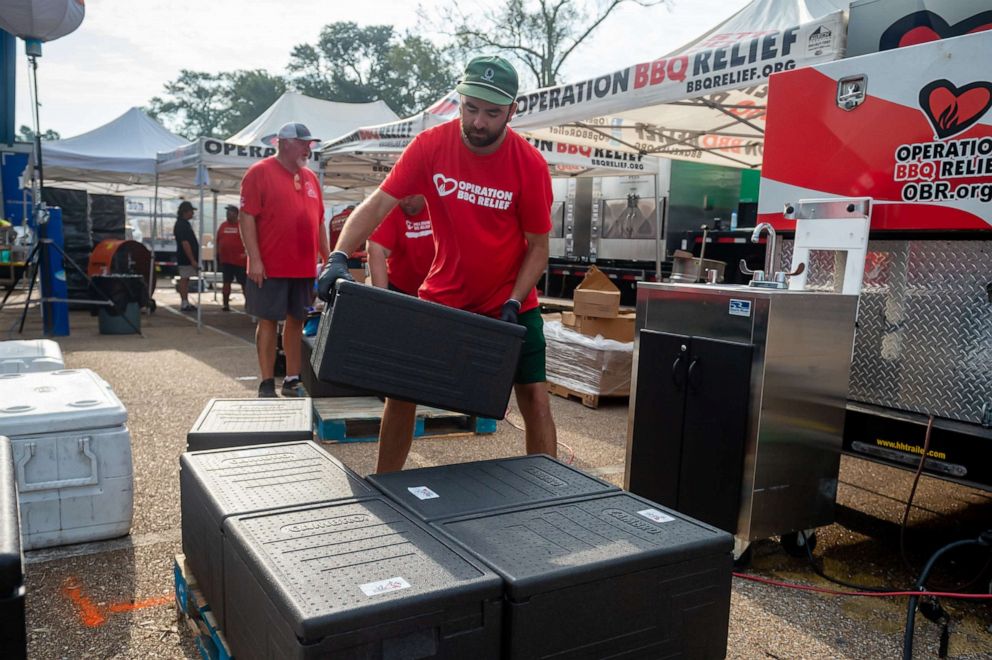 PHOTO: Volunteers work for Operation BBQ Relief in Hammond, La., to provide meals to families and first responders, Sept. 2, 2021.