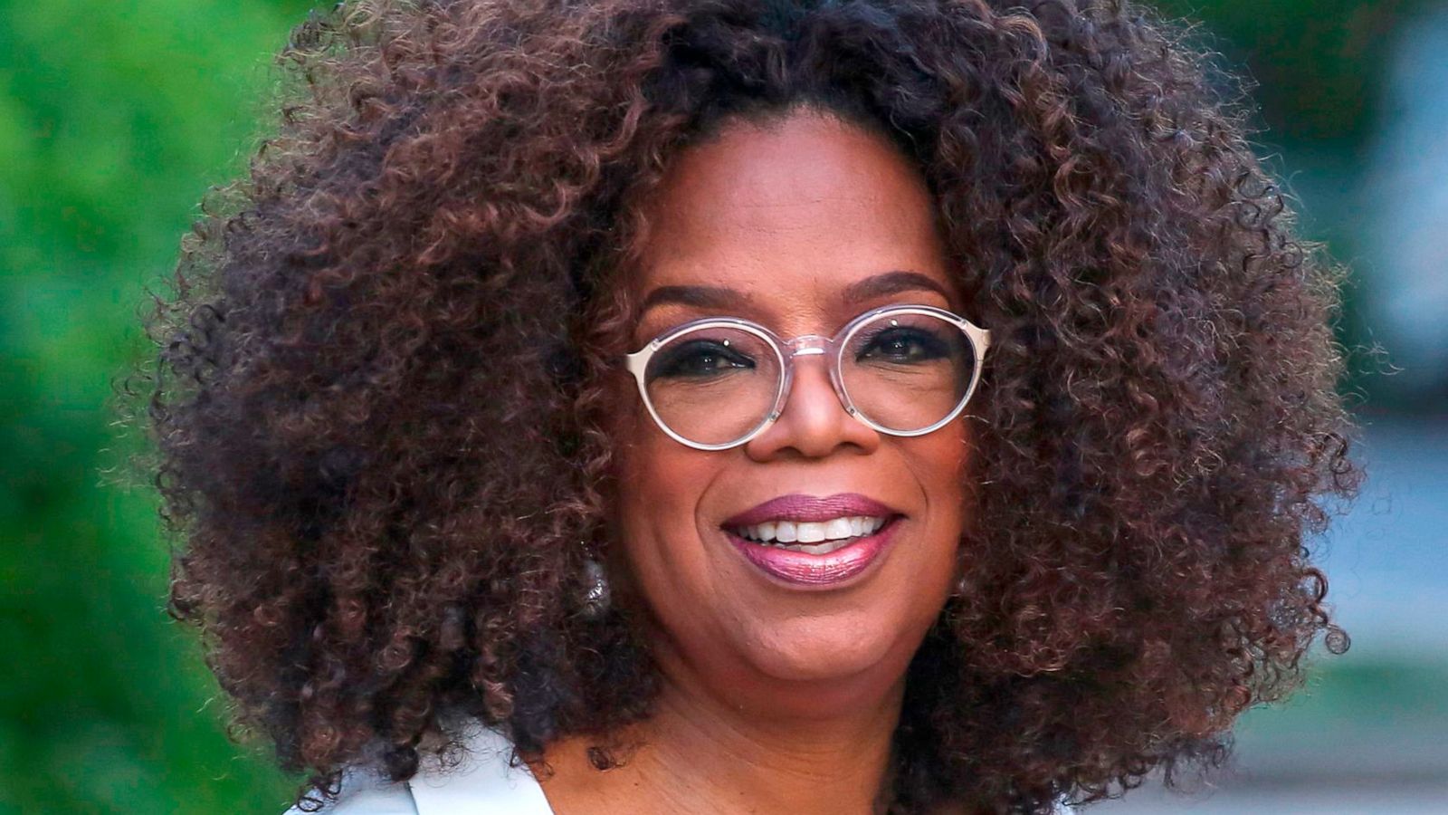 PHOTO: Oprah Winfrey waves as she arrives to the opening celebration of the Statue of Liberty Museum in New York, May 15, 2019.