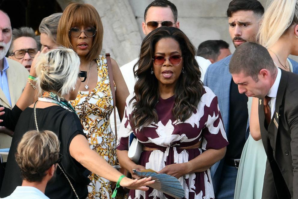 PHOTO: Gayle King and Oprah Winfrey get on a taxi boat as they leave the Gritti Palace Hotel ahead of the wedding of Amazon's founder Jeff Bezos with Lauren Sanchez in Venice, Italy, on June 26, 2025.