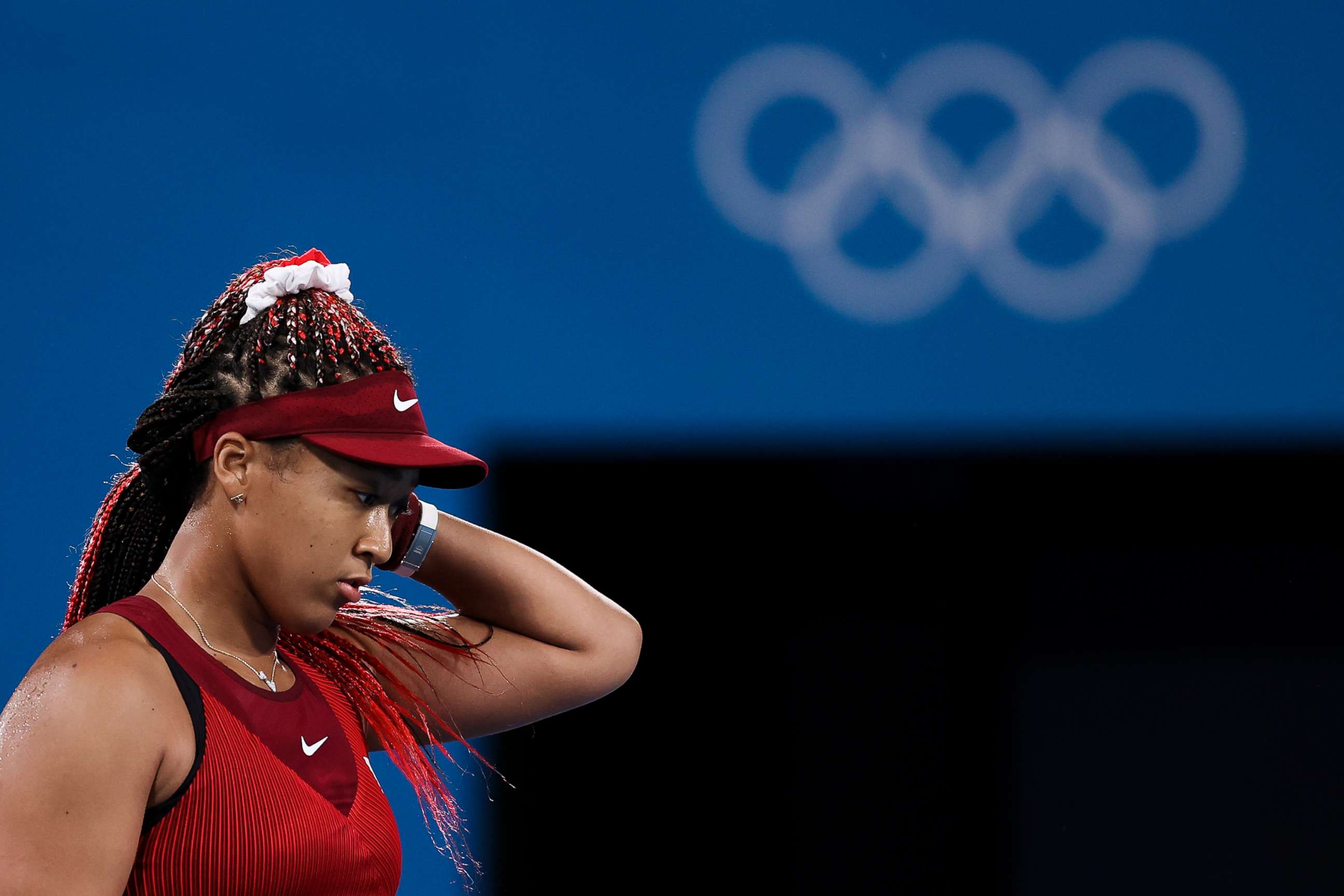 PHOTO: Naomi Osaka of Team Japan reacts after a point during her Women's Singles Third Round match against Marketa Vondrousova of Team Czech Republic on day four of the Tokyo 2020 Olympic Games at Ariake Tennis Park, July 27, 2021, in Tokyo.