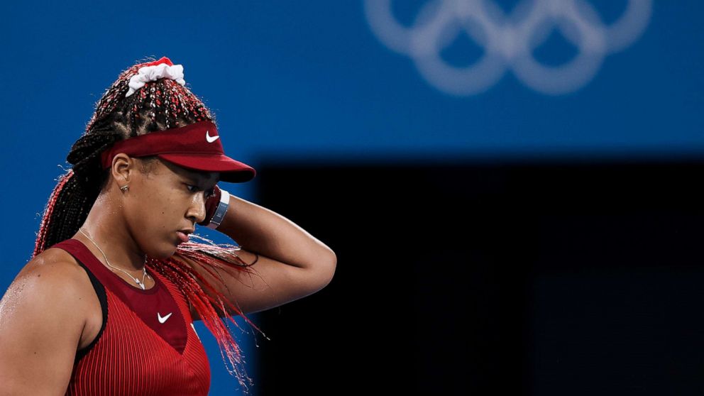 PHOTO: Naomi Osaka of Team Japan reacts after a point during her Women's Singles Third Round match against Marketa Vondrousova of Team Czech Republic on day four of the Tokyo 2020 Olympic Games at Ariake Tennis Park, July 27, 2021, in Tokyo.