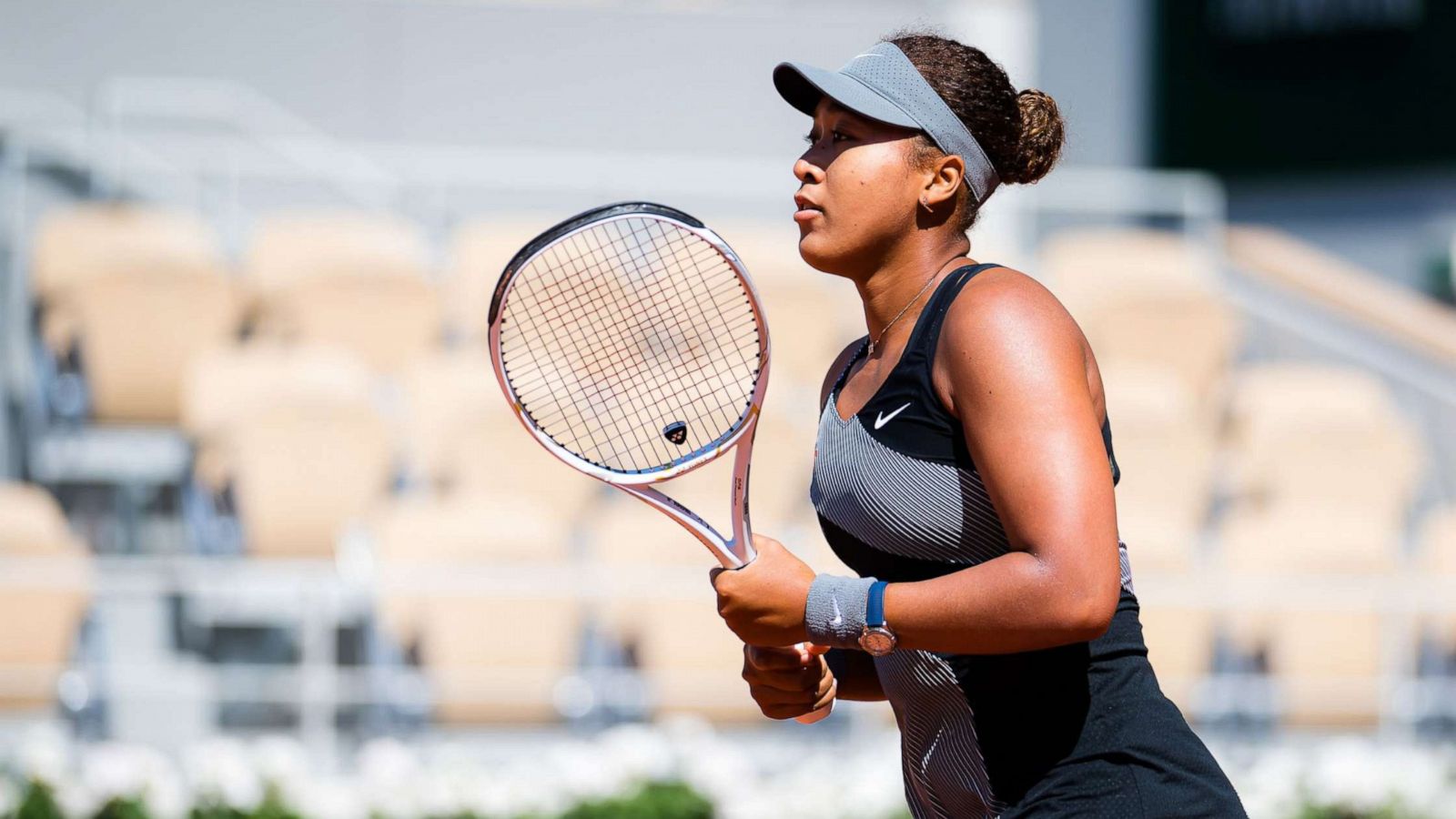 PHOTO: Naomi Osaka of Japan plays in her first round match against Patricia Maria Tig during the French Open tennis tournament in Paris, May 30, 2021.