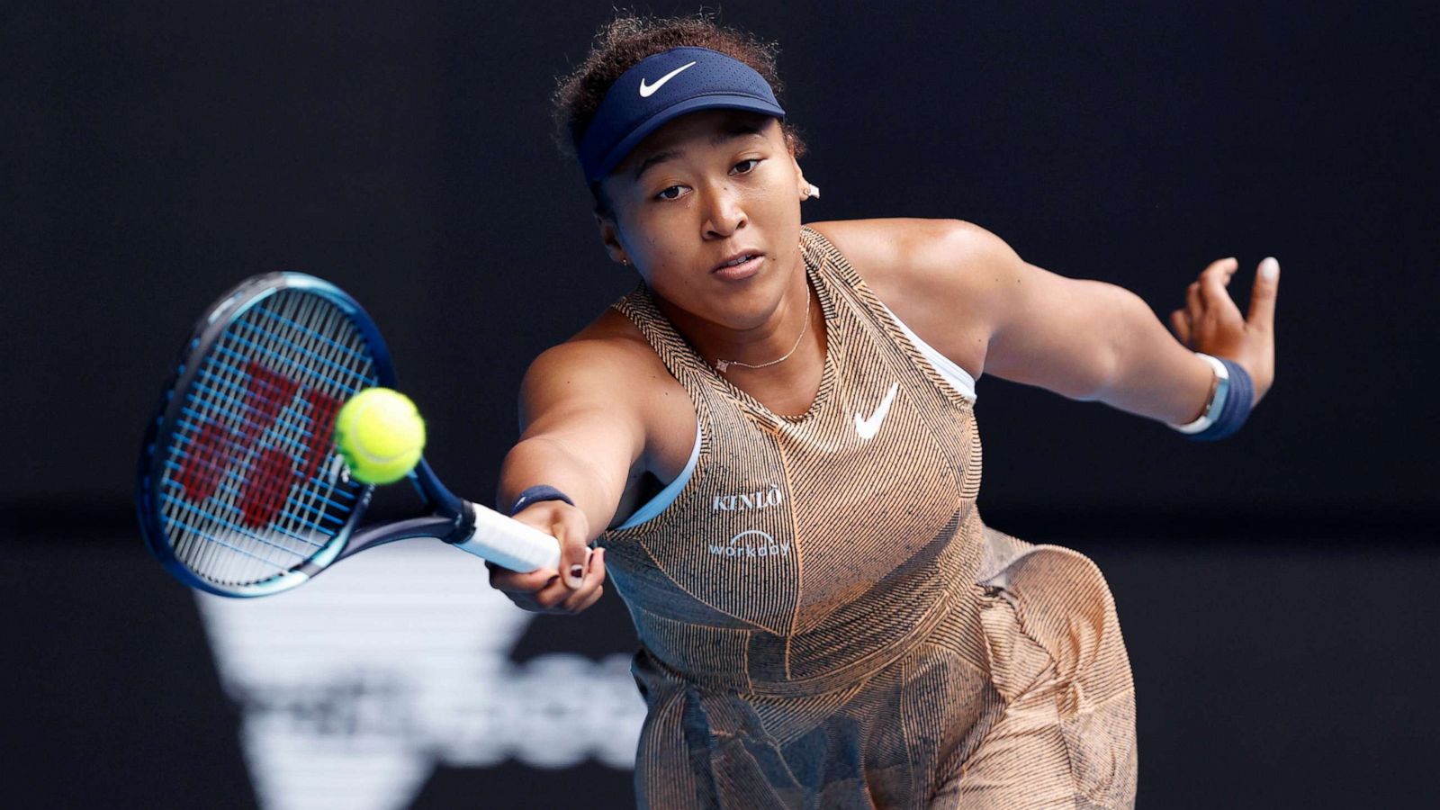 PHOTO: Naomi Osaka of Japan plays a forehand shot in her match against Alize Cornet of France during the Melbourne Summer Set at Melbourne Park on Jan. 4, 2022, in Melbourne, Australia.