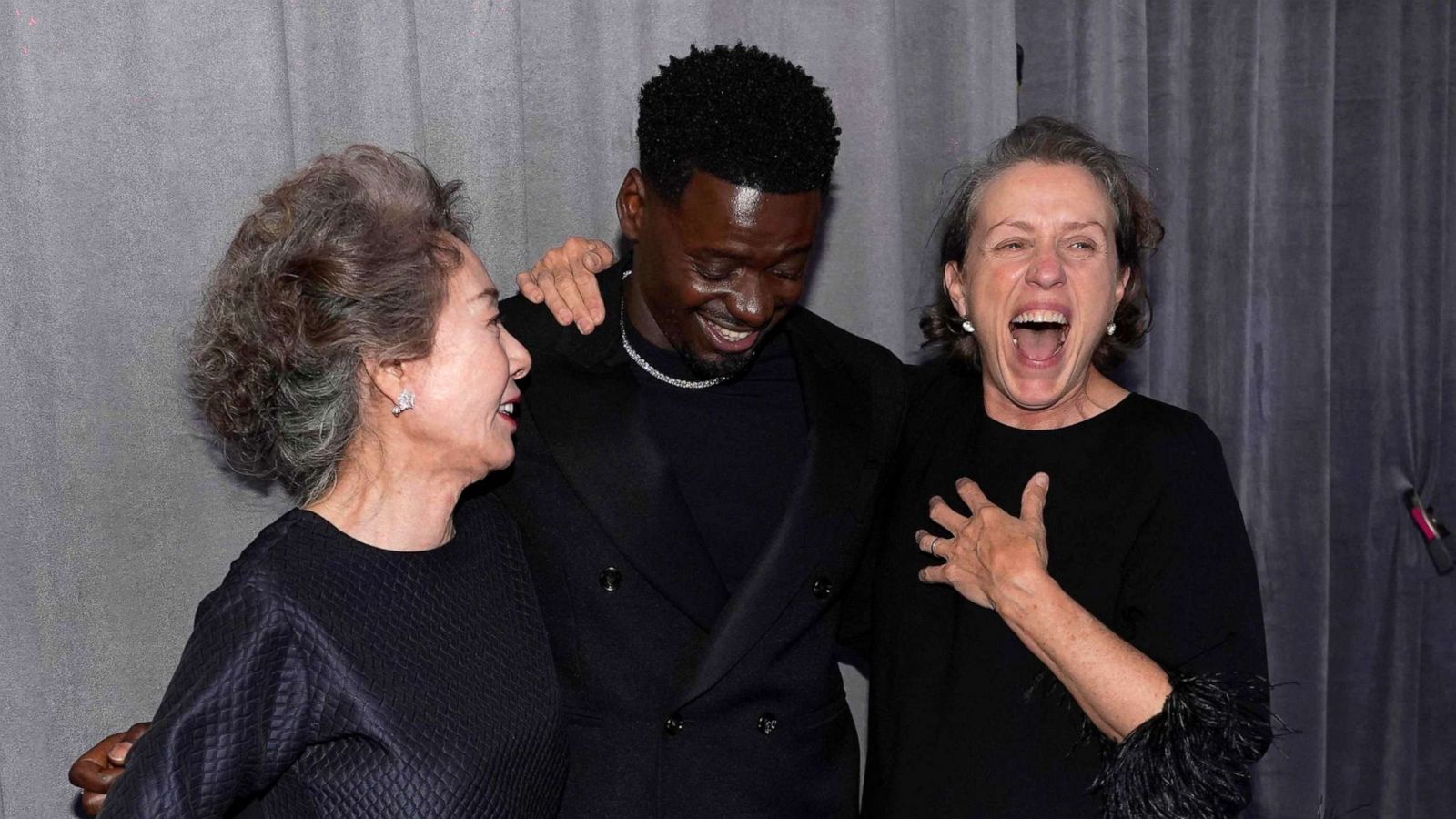 PHOTO: Yuh-Jung Youn, Daniel Kaluuya and Frances McDormand, winner of the award for best actress in a leading role for "Nomadland," pose outside the press room at the Oscars, April 25, 2021, at Union Station in Los Angeles.