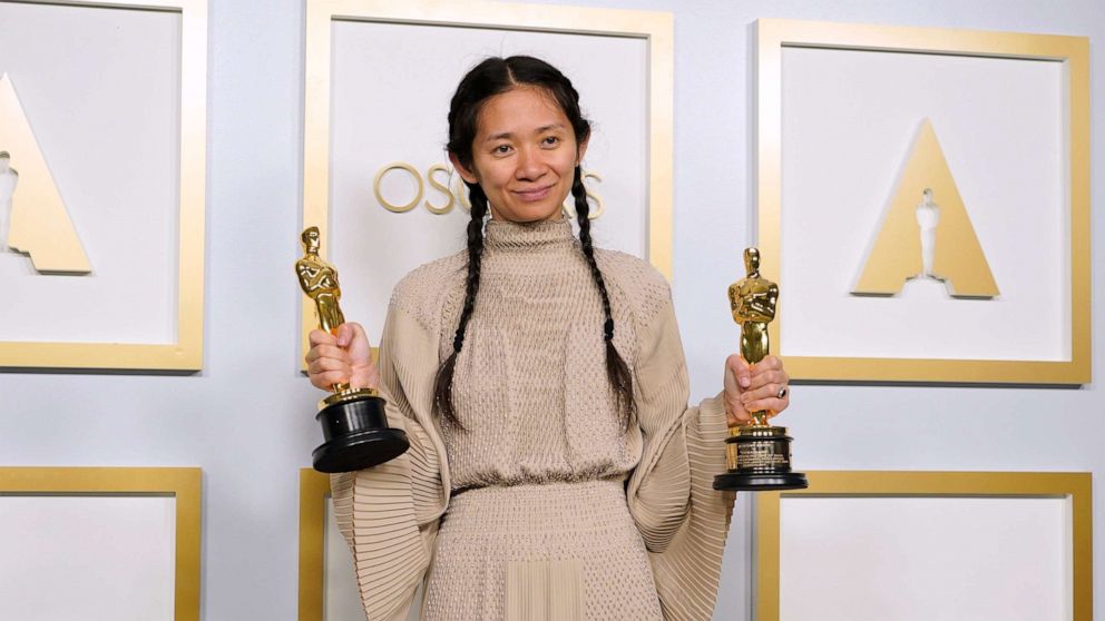 PHOTO: Chloe Zhao, winner of the awards for best picture and director for "Nomadland," poses in the press room at the Oscars, April 25, 2021, at Union Station in Los Angeles. 