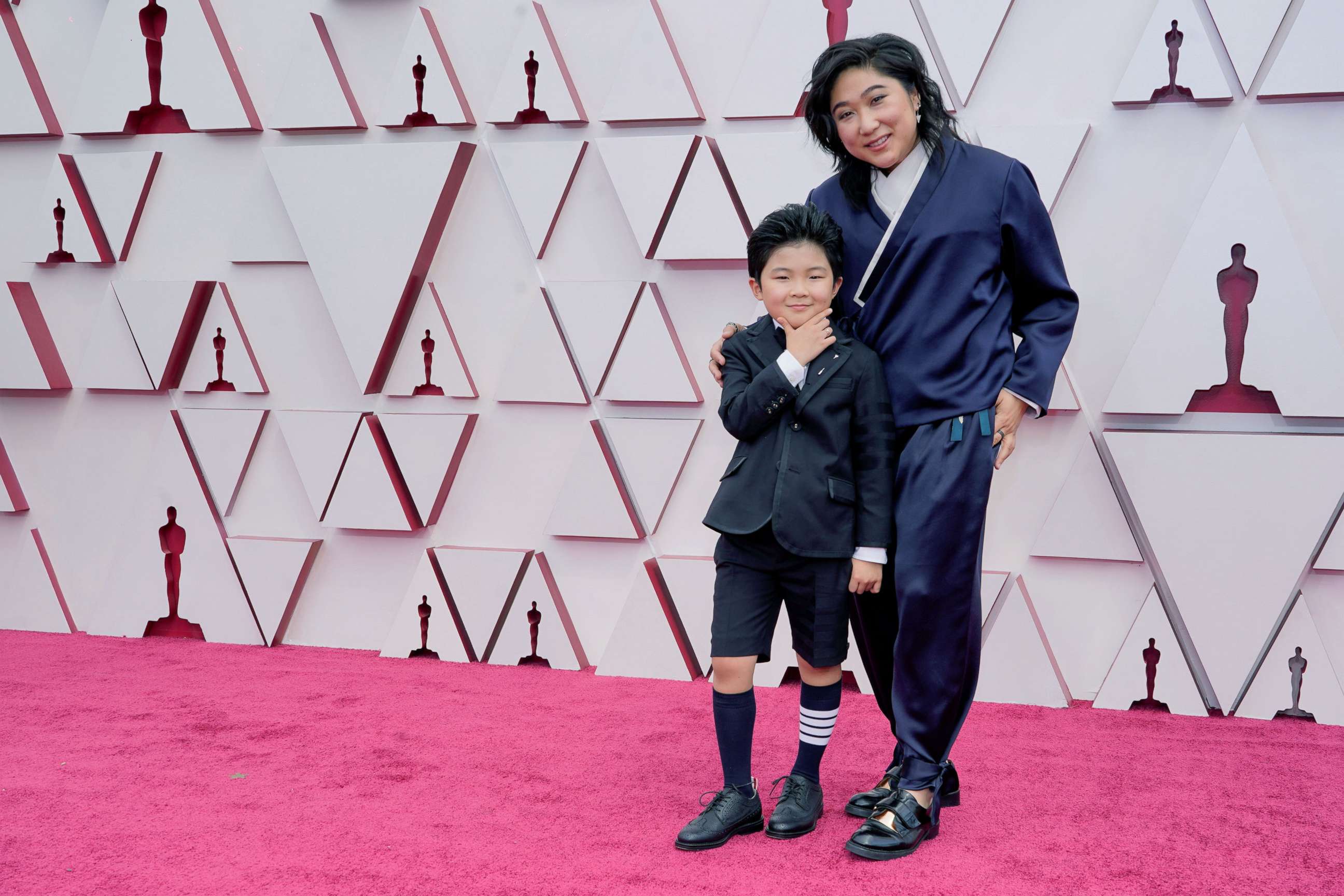 PHOTO: Alan S. Kim and Christina Oh arrive to the 93rd Academy Awards in Los Angeles, April 25, 2021. 