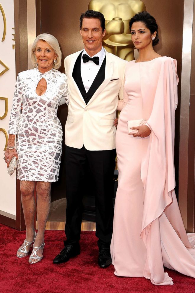 PHOTO: Matthew McConaughey, alongside mother Mary Kathlene and Camila Alves, right, attend the Academy Awards.