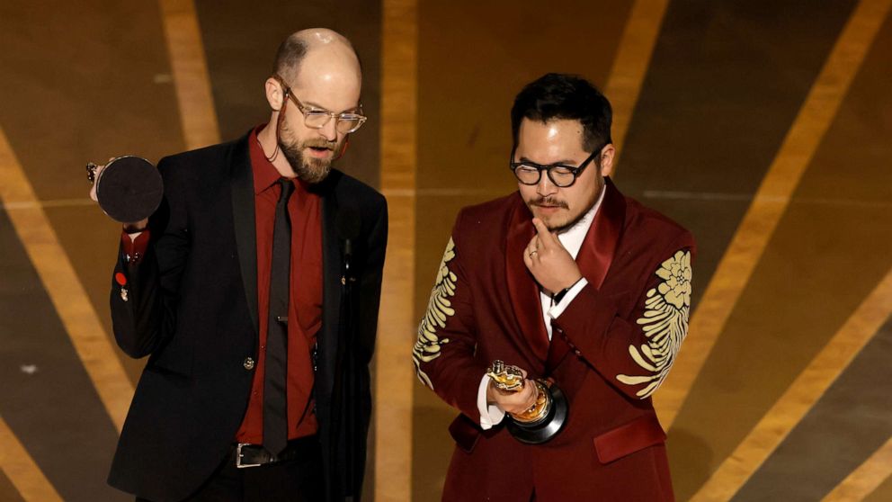 PHOTO: Daniel Scheinert and Dan Kwan accept the Best Director award for "Everything Everywhere All at Once" onstage during the 95th Annual Academy Awards at Dolby Theatre on March 12, 2023 in Hollywood, California.