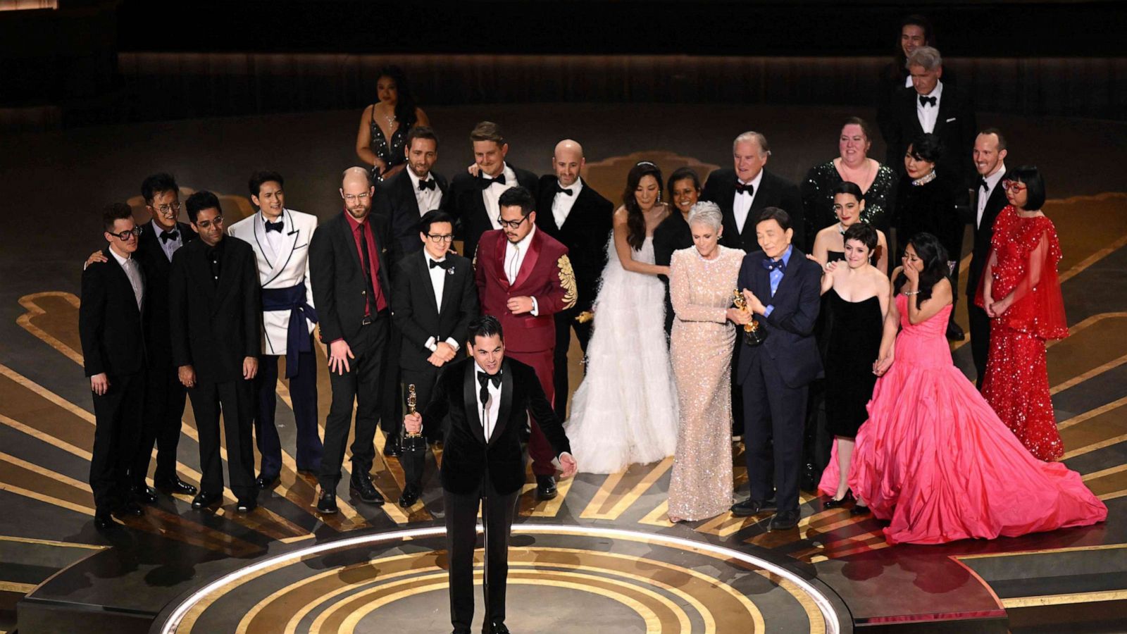 PHOTO: Jonathan Wang accepts the Oscar for Best Picture for "Everything Everywhere All at Once" onstage during the 95th Annual Academy Awards at the Dolby Theatre in Hollywood, California on March 12, 2023.