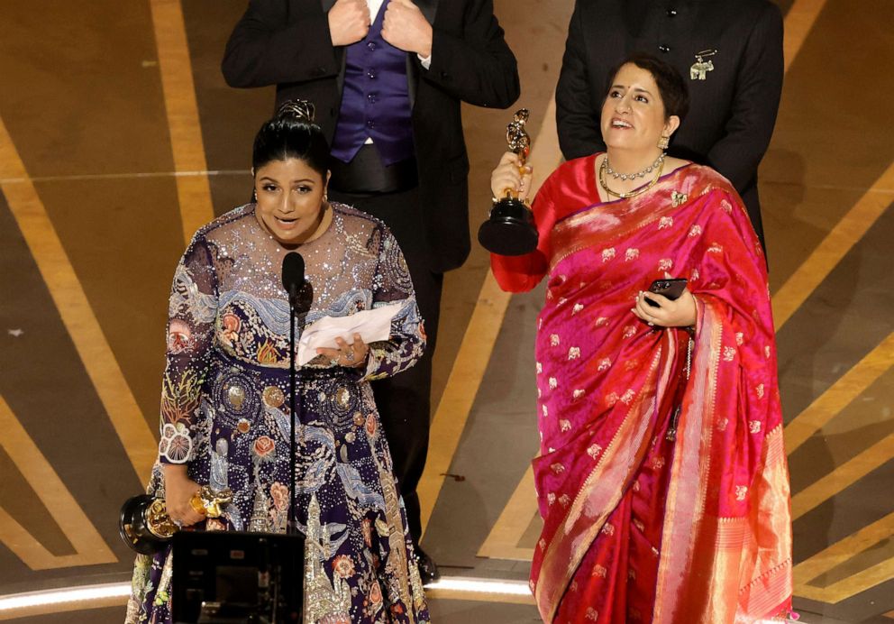 PHOTO: Kartiki Gonsalves and Guneet Monga accept the Best Documentary Short Subject award for "The Elephant Whisperers" onstage during the 95th Annual Academy Awards at Dolby Theatre on March 12, 2023 in Hollywood, California.