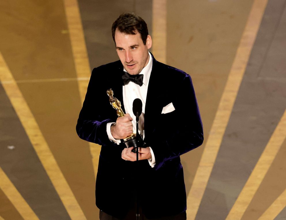 PHOTO: James Friend accepts the Best Cinematography award for "All Quiet on the Western Front" onstage during the 95th Annual Academy Awards at Dolby Theatre on March 12, 2023 in Hollywood, California.