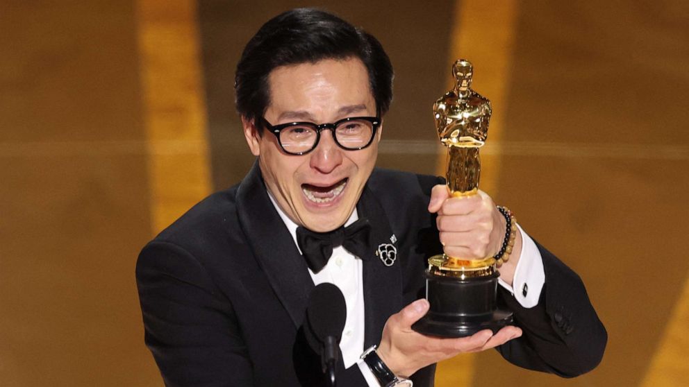 PHOTO: Ke Huy Quan accepts the Best Supporting Actor award "Everything Everywhere All at Once" onstage during the 95th Annual Academy Awards at Dolby Theatre on March 12, 2023 in Hollywood, California.