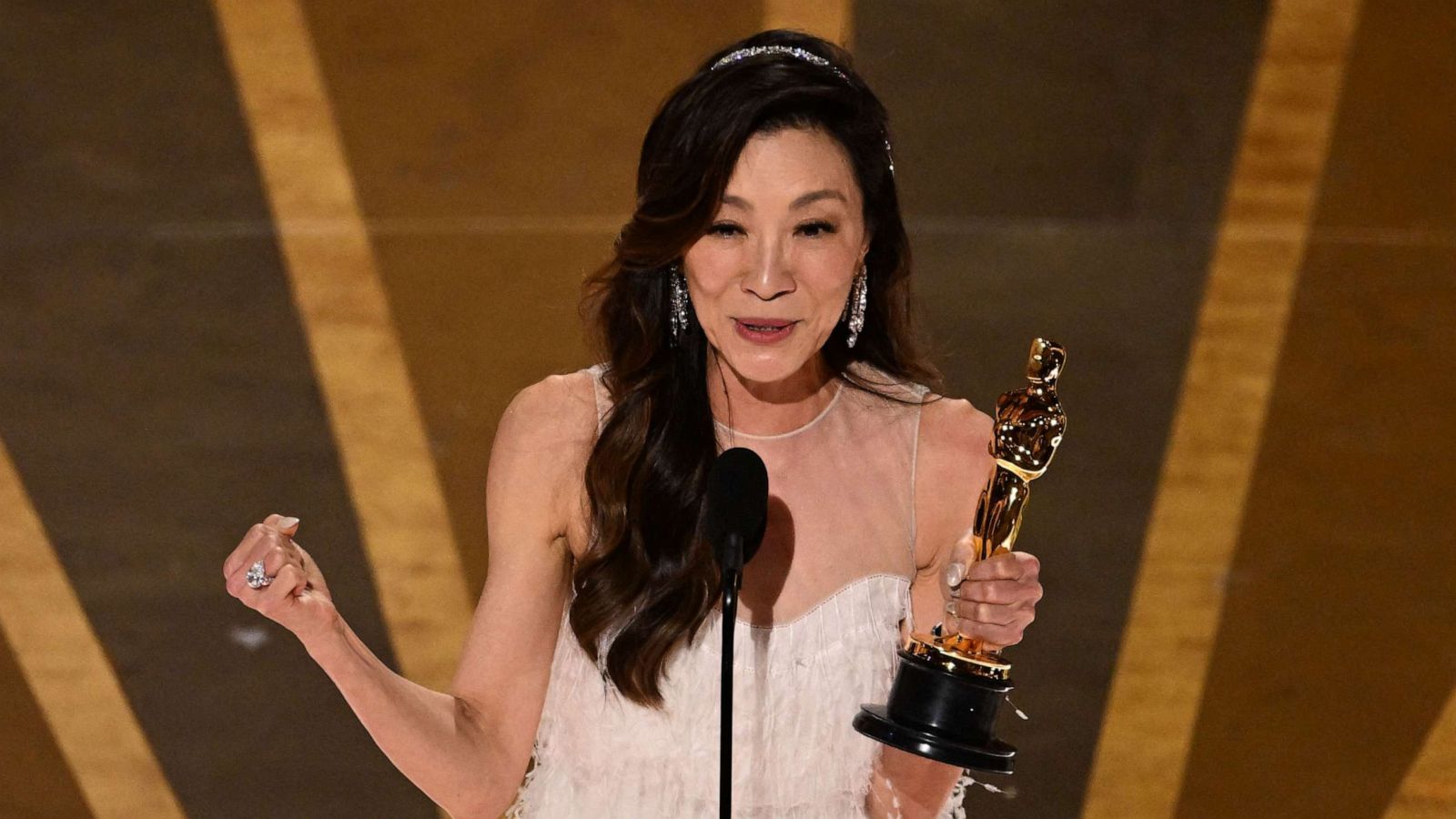 PHOTO: Michelle Yeoh accepts the Oscar for Best Actress in a Leading Role for "Everything Everywhere All at Once" onstage during the 95th Annual Academy Awards at the Dolby Theatre in Hollywood, California on March 12, 2023.