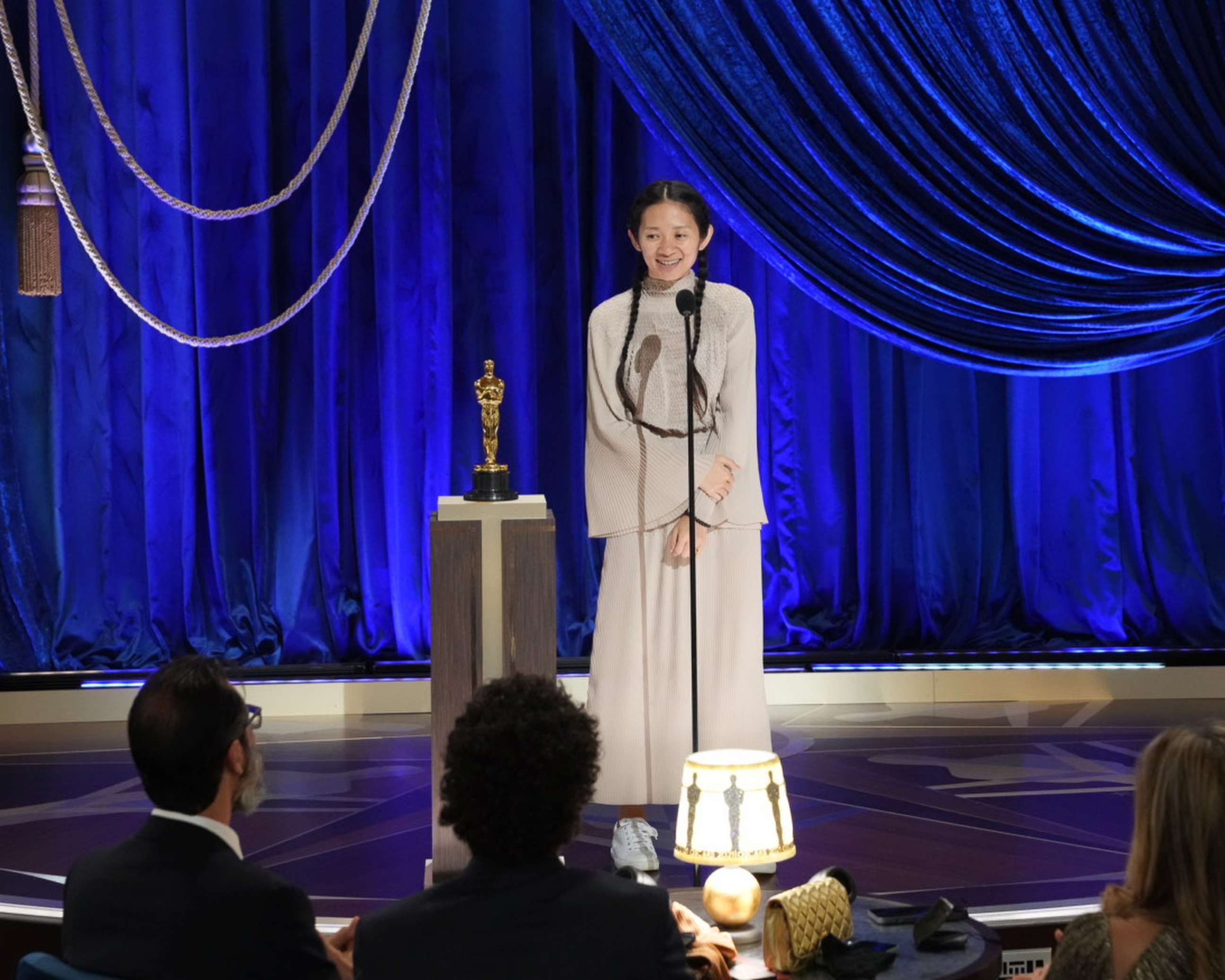 PHOTO: Movie director Chloe Zhao speaks after accepting the Oscar for Best Director for "Nomadland," April 25, 2021, in Los Angeles.