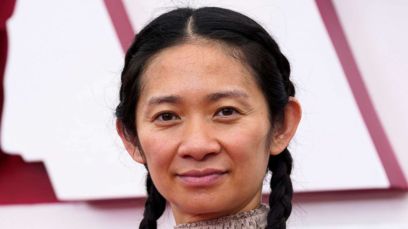 PHOTO: Chloe Zhao arrives at the 93rd Academy Awards in Los Angeles, April 25, 2021.