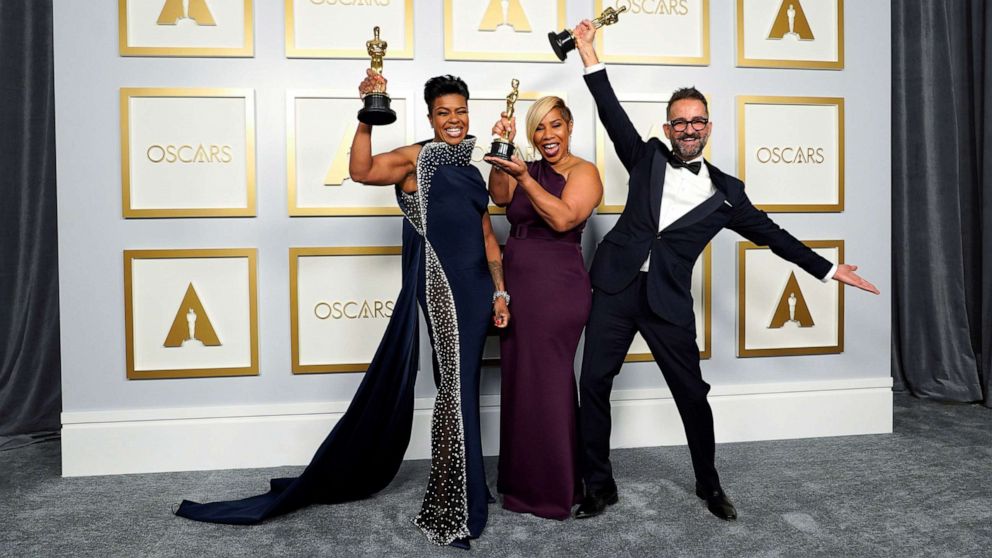 PHOTO: Mia Neal, Jamika Wilson and Sergio Lopez-Rivera, winners of the award for Best Makeup and Hairstyling for "Ma Rainey's Black Bottom" pose in the press room at the Oscars, in Los Angeles, April 25, 2021. 
