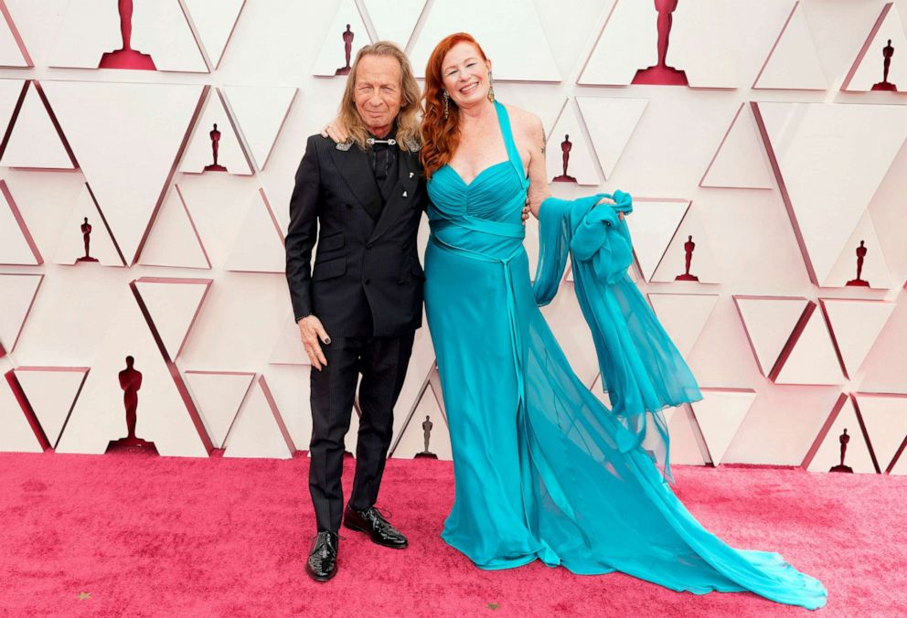 PHOTO: Paul Raci and Liz Hanley Raci attend the 93rd Annual Academy Awards, April 25, 2021, in Los Angeles. 