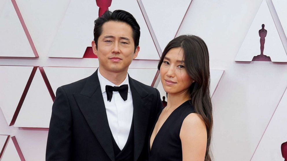 PHOTO: Steven Yeun and Joana Pak attend the 93rd Annual Academy Awards, April 25, 2021, in Los Angeles. 