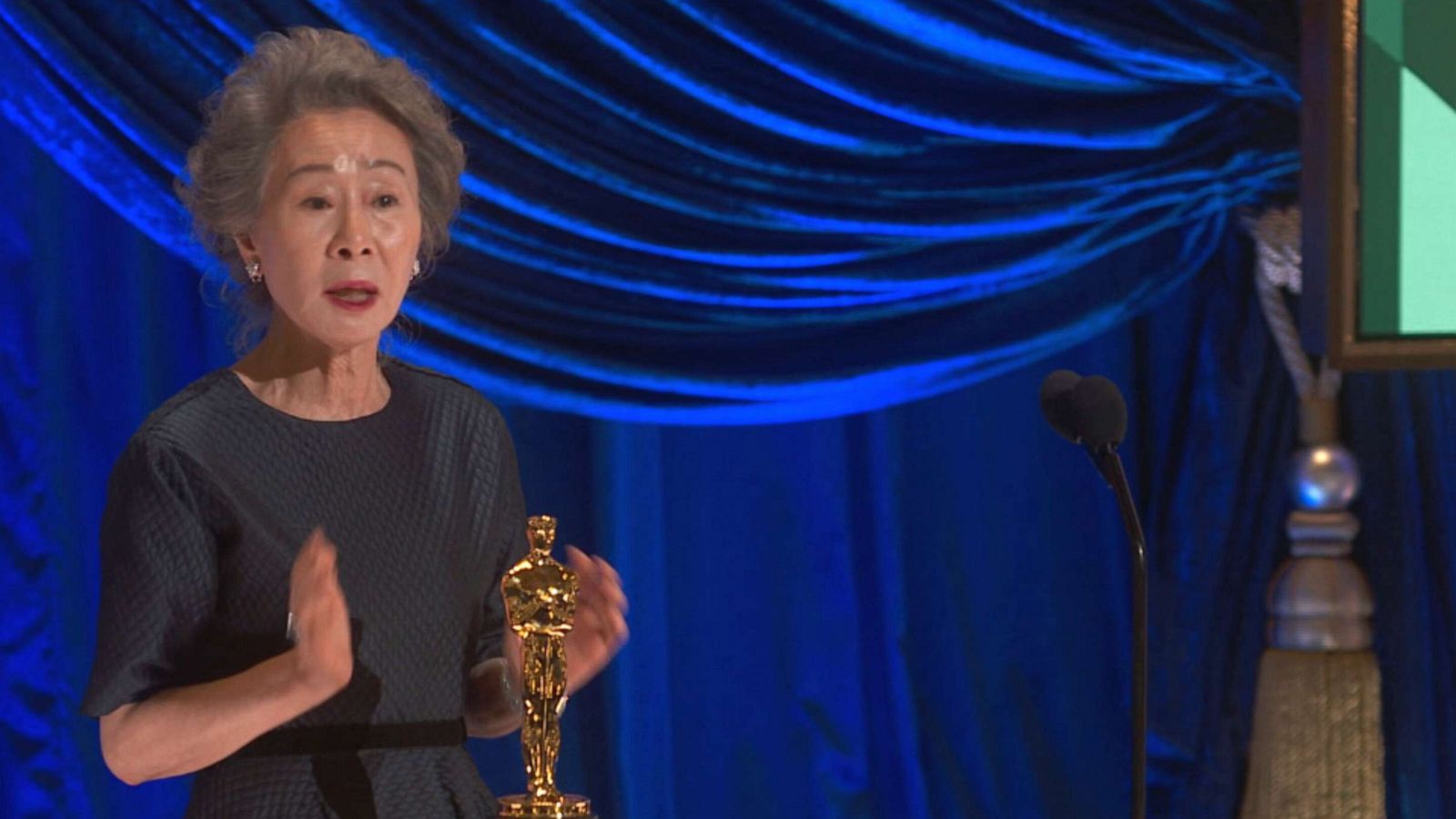 PHOTO: Yuh-Jung Youn speaks after accepting the Oscar for Actress in a Supporting Role in the movie "Minari," April 25, 2021, in Los Angeles.