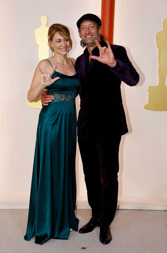 PHOTO: Troy Kotsur and Deanne Bray attend the 95th Academy Awards in Hollywood, Mar. 12, 2023.