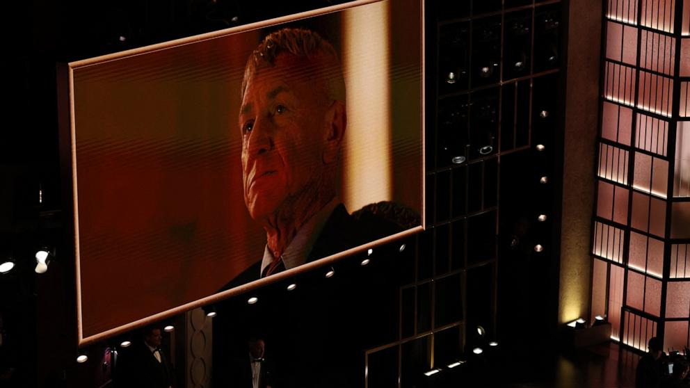 PHOTO: A photo of Sean Penn is shown onstage after he won the Oscar for Best Actor in a Supporting Role for "One Battle After Another" during the 98th Annual Academy Awards at the Dolby Theatre in Hollywood, March 15, 2026. 