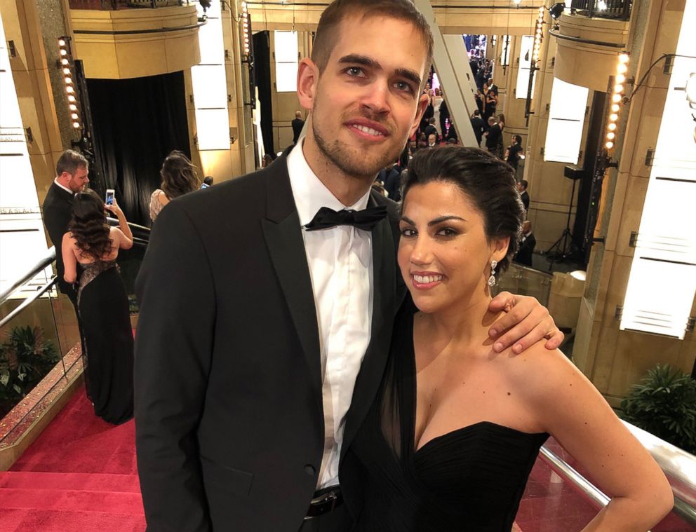 PHOTO: Rayka Zehtabchi and Sam Davis pose on the steps on the Dolby Theatre before entering the Oscars ceremony.