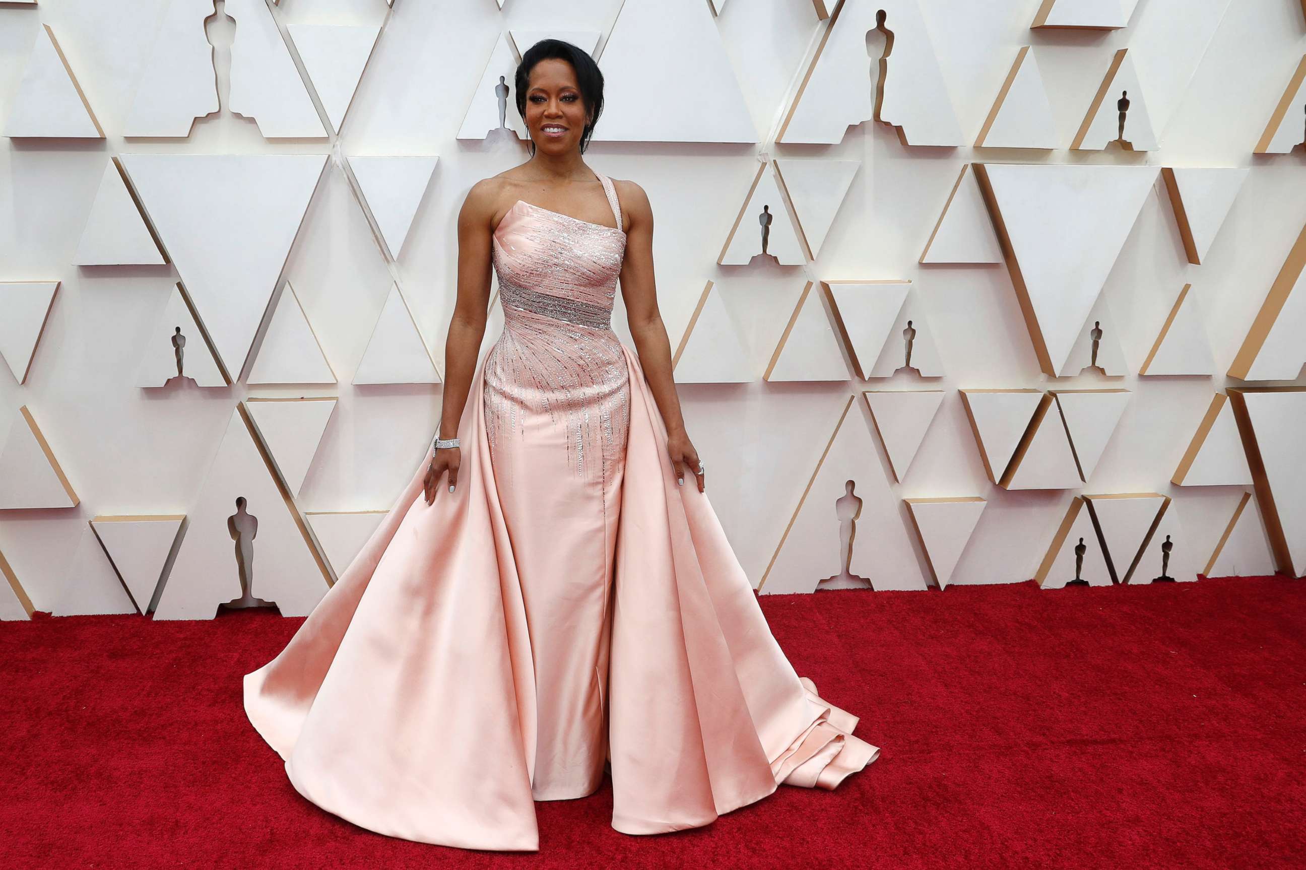 PHOTO: Regina King poses on the red carpet during the Oscars arrivals in Hollywood, Calif., Feb. 9, 2020.