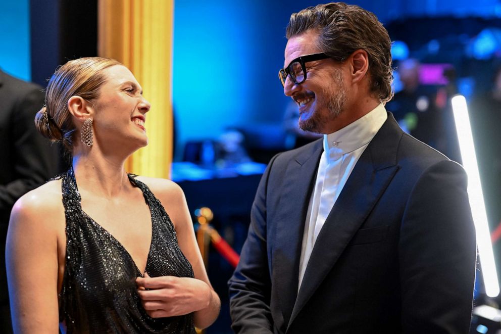 PHOTO: Elizabeth Olsen and Pedro Pascal backstage during the 95th Annual Academy Awards on Mar. 12, 2023, in Hollywood.