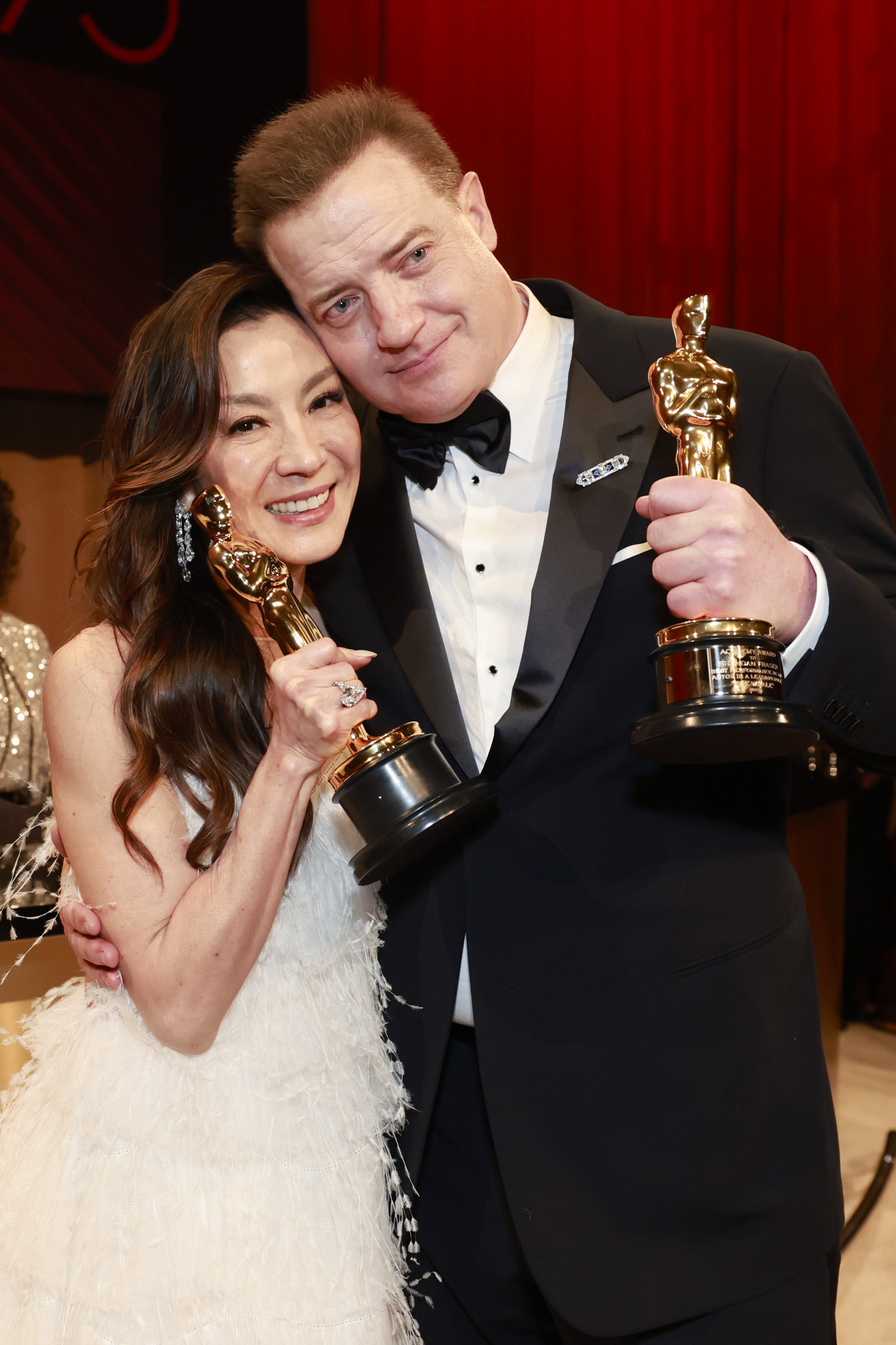 PHOTO: Michelle Yeoh, winner of the Best Actress in a Leading Role award for "Everything Everywhere All At Once," and Brendan Fraser, winner of the Best Actor in a Leading Role award for "The Whale", attend the Governors Ball, Mar. 12, 2023, in Hollywood.