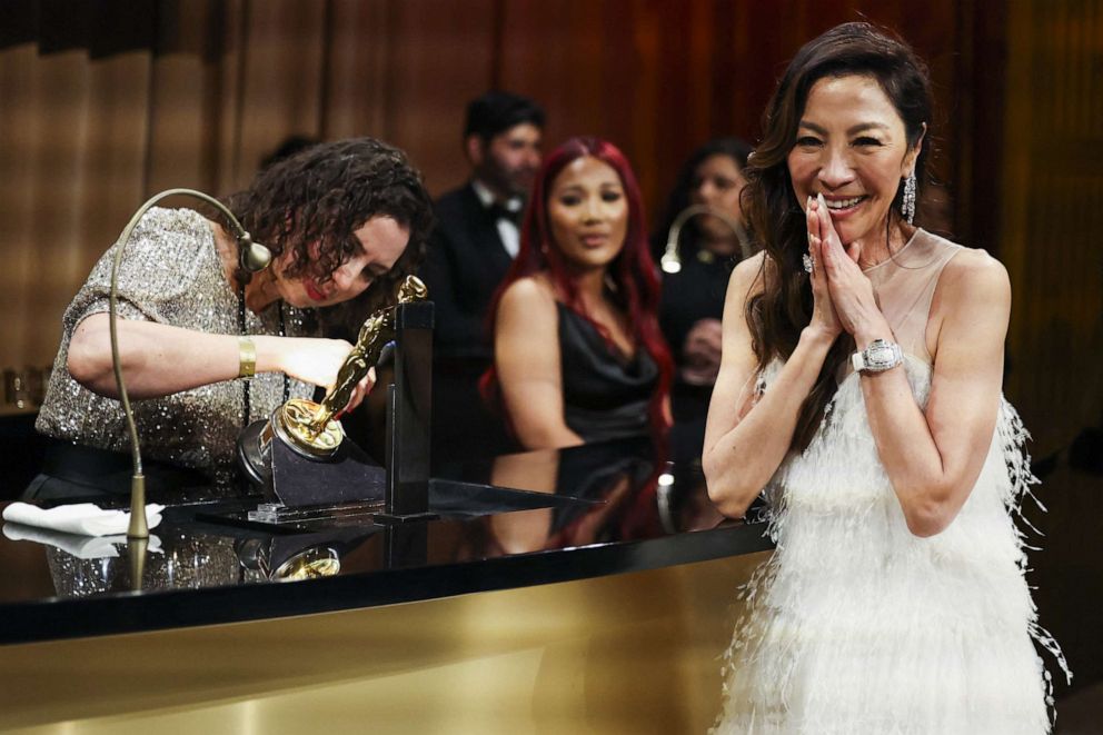 PHOTO: Best Actress Michelle Yeoh waits to have her Oscar engraved at the Governors Ball following the 95th Academy Awards in Hollywood, Mar. 12, 2023.