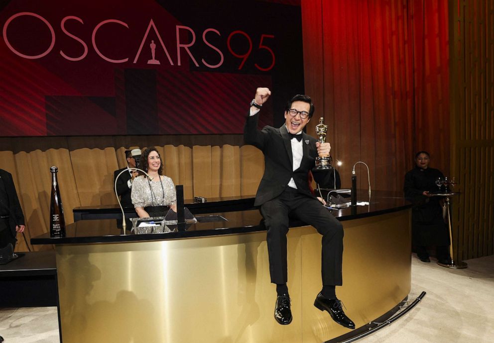 PHOTO: Best Supporting Actor Ke Huy Quan holds up his Oscar after having it engraved with his name