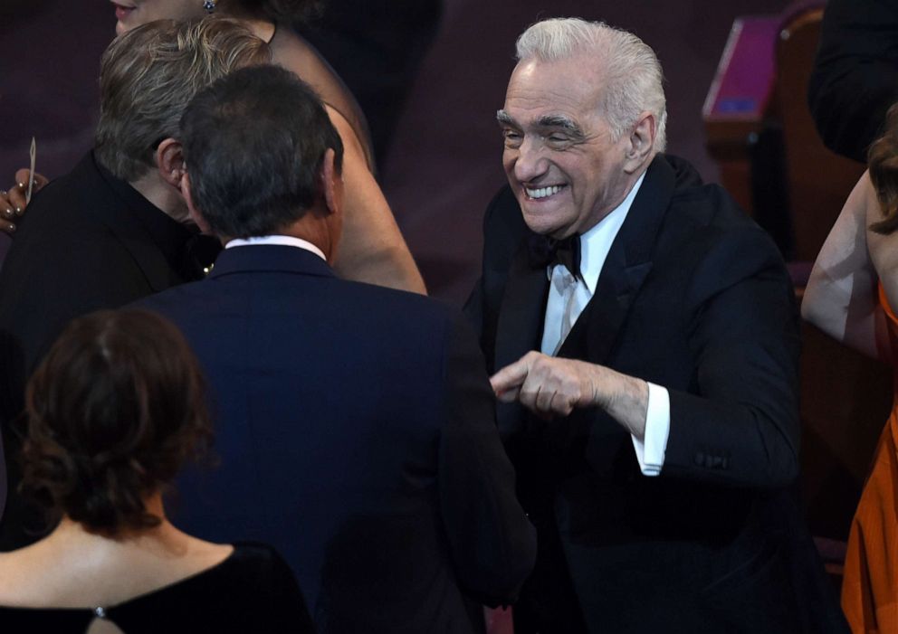 PHOTO: Martin Scorsese, right, is seen in the audience before the start of the Oscars on Sunday, Feb. 9, 2020, at the Dolby Theatre in Los Angeles. (AP Photo/Chris Pizzello)