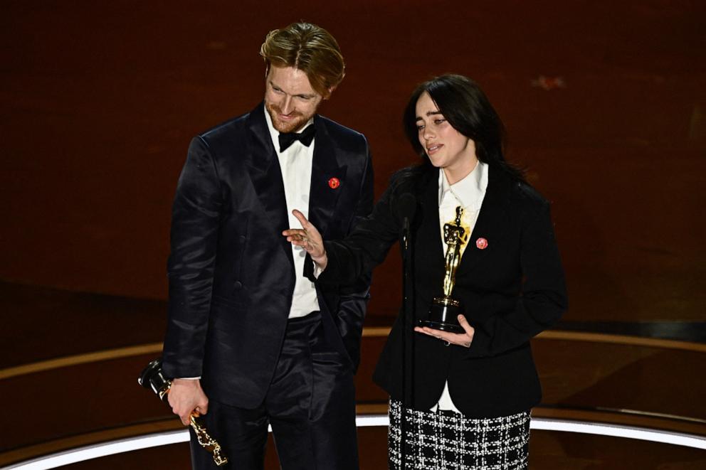 PHOTO: Billie Eilish (R) and US singer-songwriter Finneas O'Connell accept the award for Best Original Song for "What Was I Made For" from "Barbie" onstage during the 96th Annual Academy Awards at the Dolby Theatre in Hollywood, Calif. on March 10, 2024.