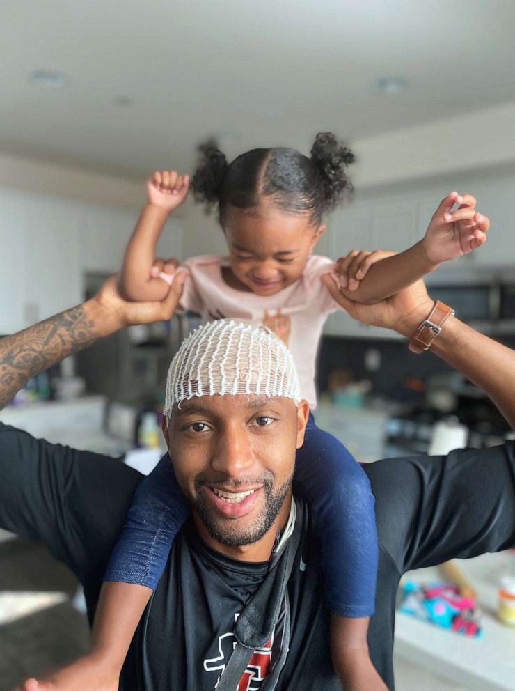 PHOTO: In this May 2020, photo, Osmond Nicholas is shown with his 18 month old daughter, Riyah.