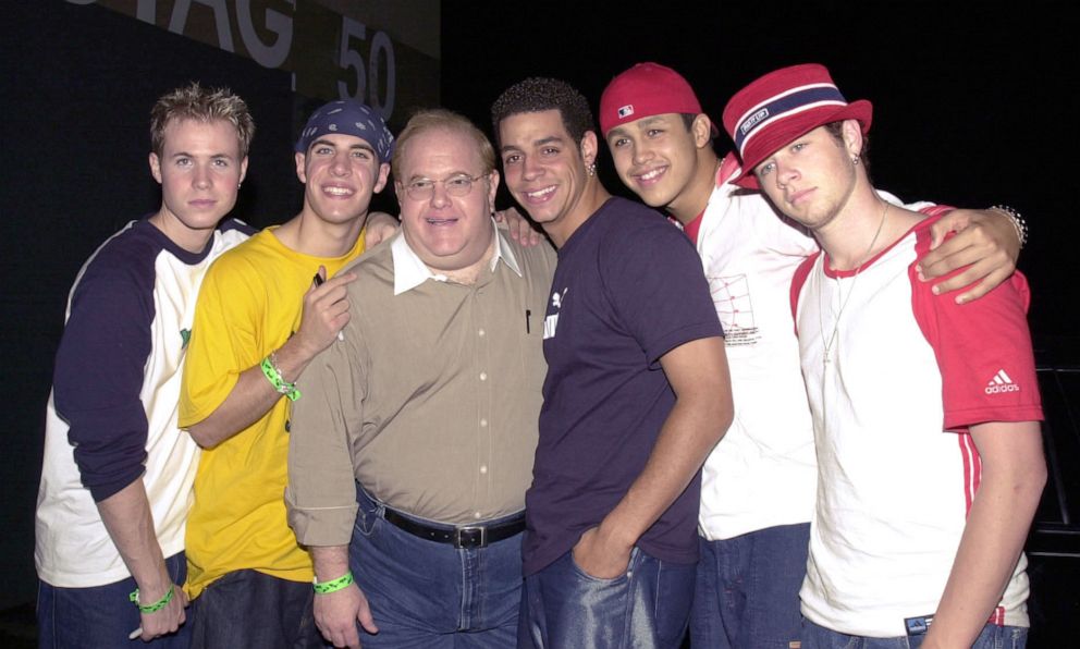 PHOTO: O-Town poses with their producer Lou Pearlman. L-R: Ashley Parker Angel, Dan Miller, Lou Pearlman, Trevor Penick, Erik-Michael Estrada and Jacob Underwood. 