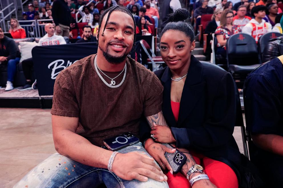 PHOTO: In this Jan. 29, 2024 file photo Simone Biles and Jonathan Owens attend a game between the Houston Rockets and the Los Angeles Lakers at Toyota Center in Houston.