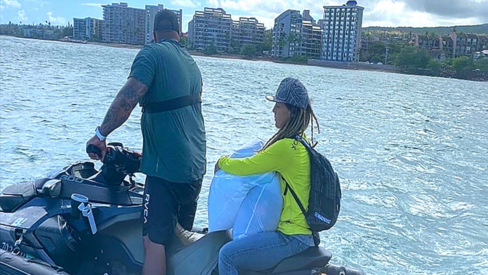 PHOTO: A Pacific Birth Collective volunteer boards a jet ski to take baby supplies to families in need after the Maui wildfires.