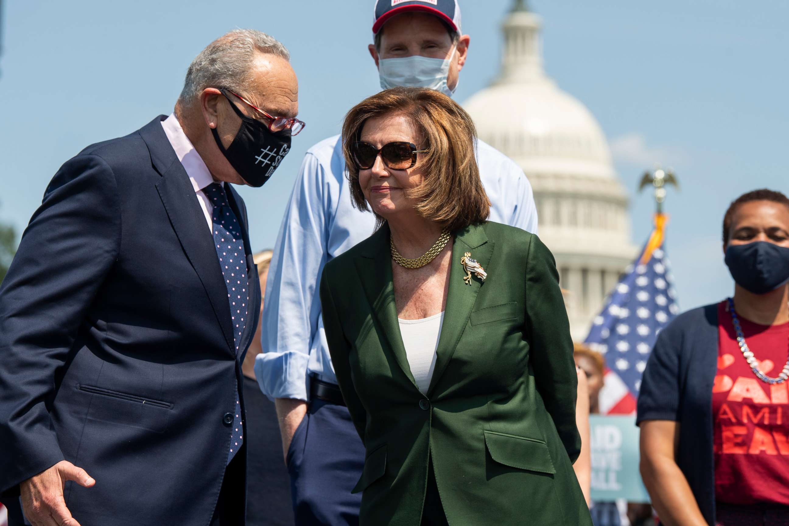 PHOTO: House Speaker Nancy Pelosi and Senate Majority Leader Charles Schumer attend a rally to advocate for paid family and medical leave, near the Capitol Reflecting Pool in Washington, Aug. 04, 2021.