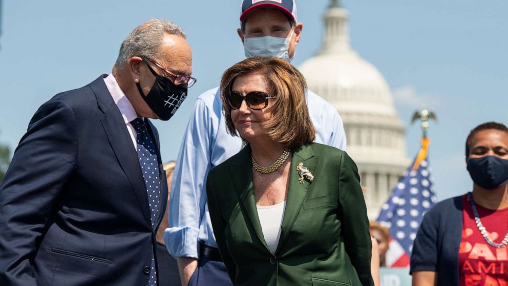 PHOTO: House Speaker Nancy Pelosi and Senate Majority Leader Charles Schumer attend a rally to advocate for paid family and medical leave, near the Capitol Reflecting Pool in Washington, Aug. 04, 2021.