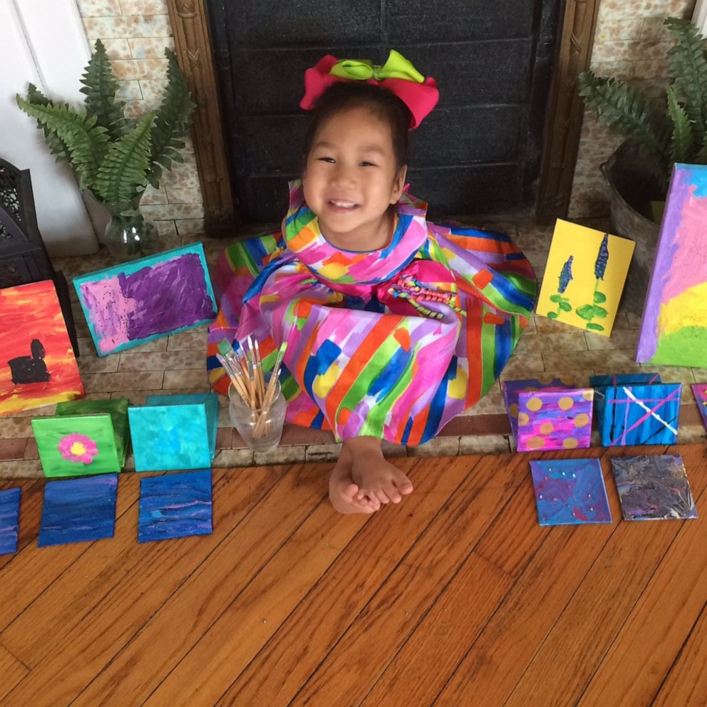 VIDEO: Girl born without arms makes paintings all by herself
