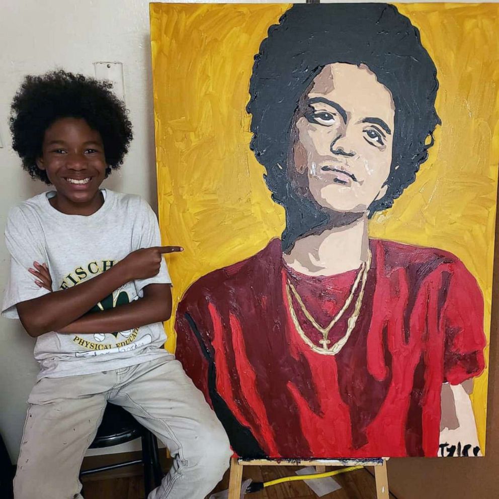 PHOTO: Tyler Gordon, 12, is a talented artist who is seen with a portrait he painted of Bruno Mars.