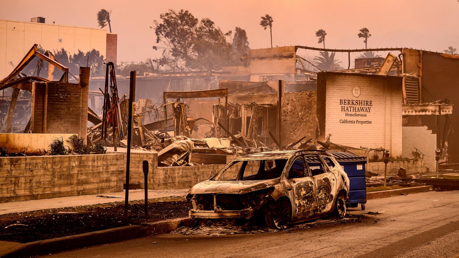 PHOTO: A Berkshire Hathaway office is left in smoldering ashes during the Palisade fire in the Palisade village area of the Pacific Palisades, a neighborhood of Los Angeles, Jan. 8, 2025.