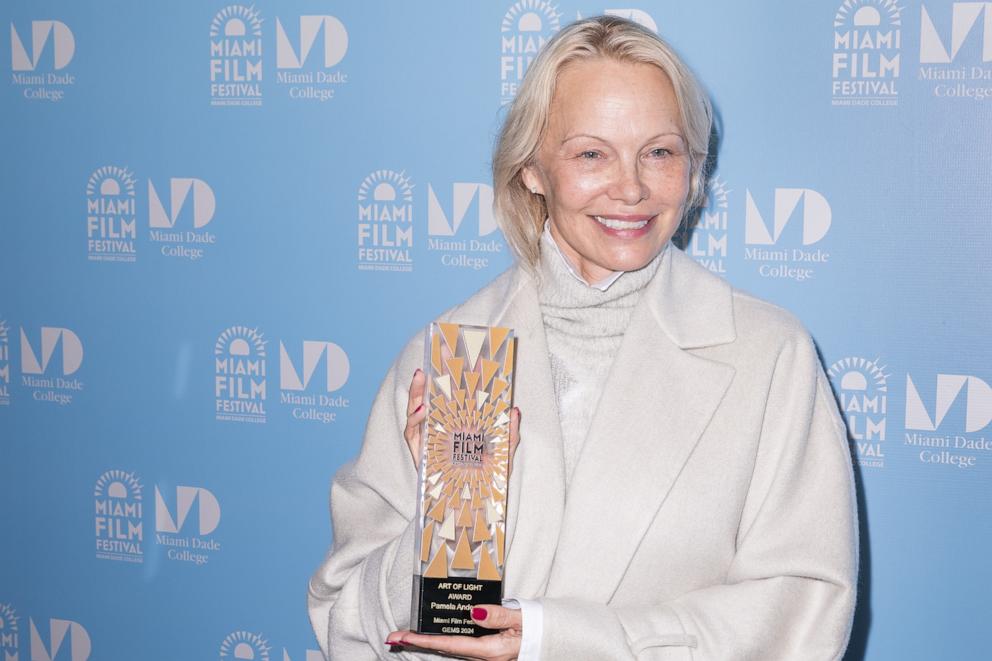 PHOTO: Pamela Anderson receives the Art of Light Award at the "The Last Showgirl" screening during Miami Film Festival GEMS at Regal South Beach, Nov. 3, 2024, in Miami Beach.